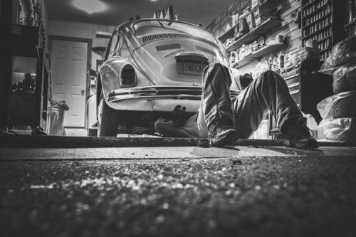 mobile mechanic working on car