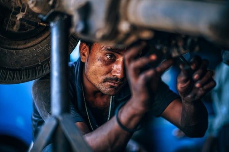 Mechanic fixing a truck